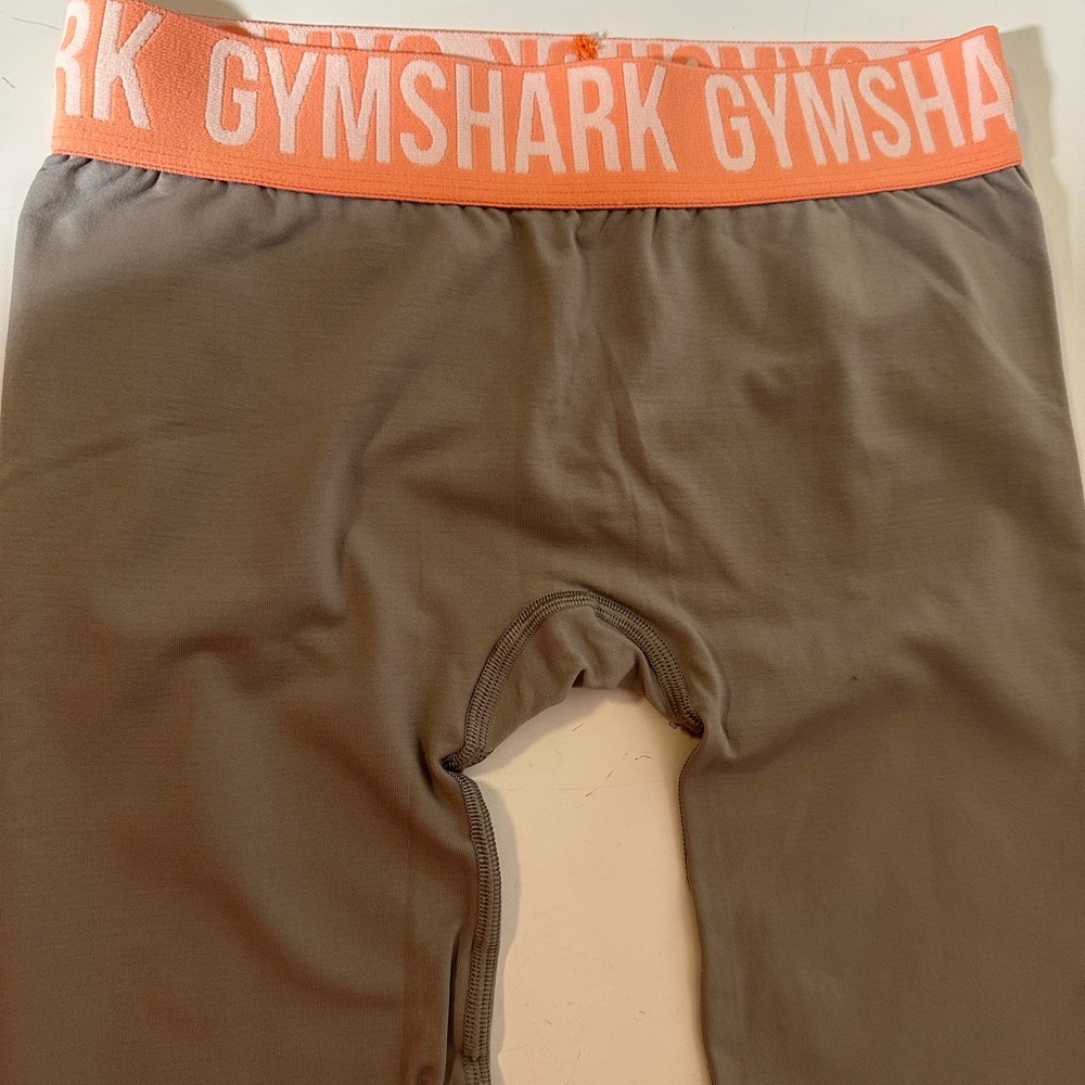 Gymshark low-rise fit seamless leggings in grey/contrasting orange waistband.